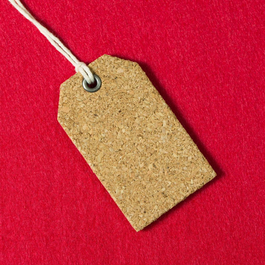 Blank price tag Blank price tag or gift tag on red background